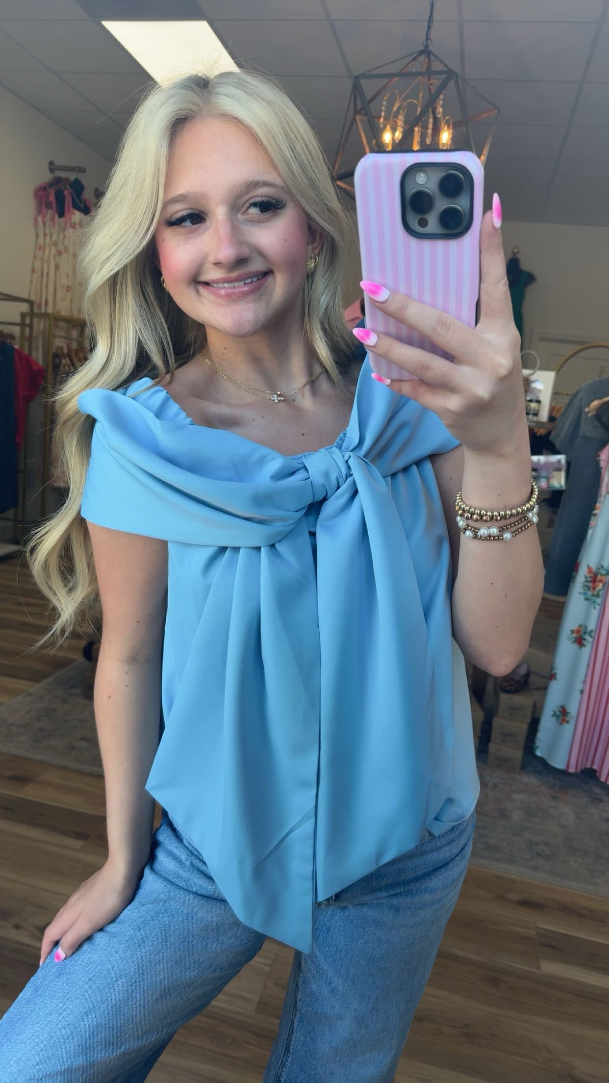 Blue off the shoulder bow shirt